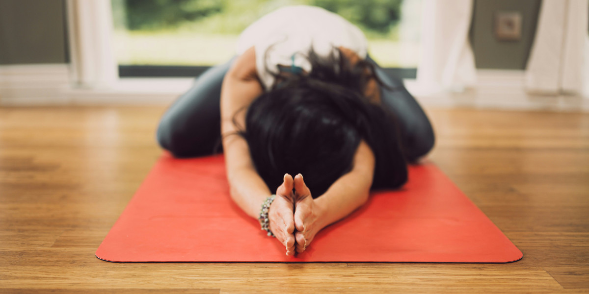 Child's pose in Yin Yoga class